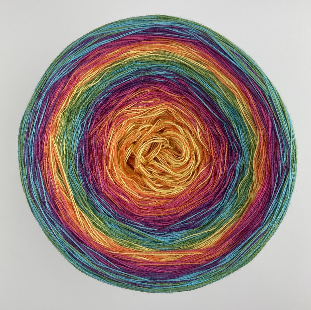 Rainbow gradient yarn.  50% cotton, 50% acrylic.  Light centre.