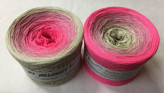 2 cakes of the Wolltraum My Melodyy gradient yarn colourway Barbie Girl.  They go from bright pink to beige.