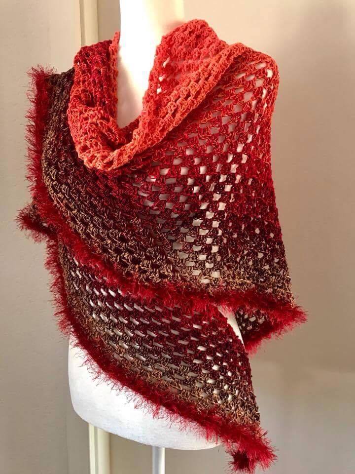 A shawl made with the Wolltraum colourway Bed of Roses.
