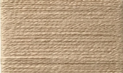 A closeup of a single colour yarn in medium beige.