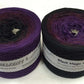 2 cakes of the Wolltraum My Melodyy gradient yarn colourway Black Magic Woman.  It goes from a deep purple to black.