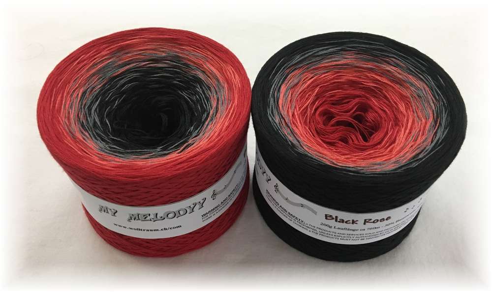 2 cakes of the Wolltraum My Melodyy gradient yarn colourway Black Rose.  It goes from red to black.
