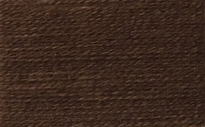A closeup of the Wolltraum yarn single colour Brown.