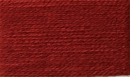 A closeup of the Wolltraum yarn single colour Burgundy.