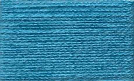 A close-up of the Wolltraum yarn single colour Capri.  It is a bright, vivid blue.