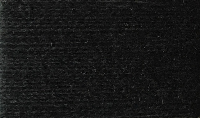 A close up of the Wolltraum yarn single colour black.